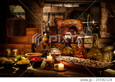 Medieval ancient kitchen tabe with typical food in 25592128