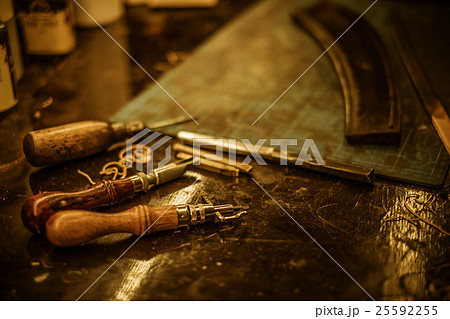 Close-up blacksmith tools for making leather Close-up blacksmith tools for making leather 25592255