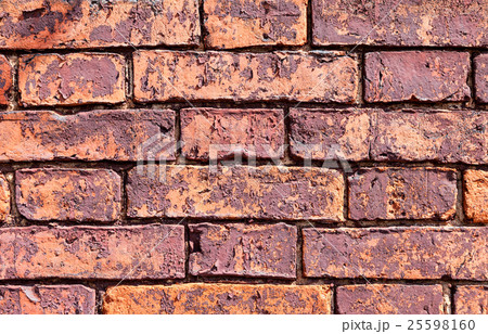 Old weathered red brick wall as background Old weathered red brick wall as background 25598160