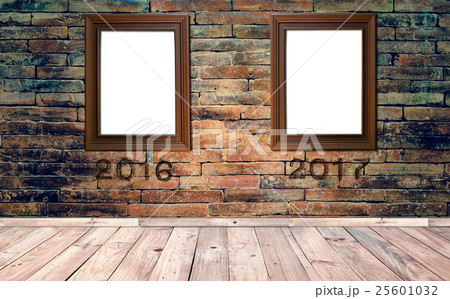 Blank wooden frame on brick wall 25601032