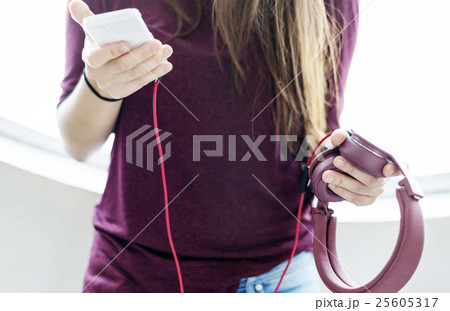 Young Woman Listening Music Concept 25605317