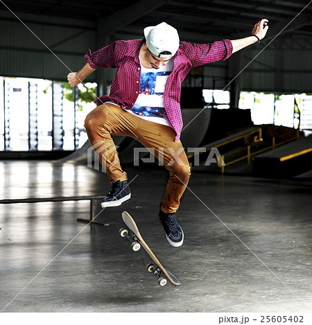Boy Skateboarding Jump Lifestyle Hipster Concept Boy Skateboarding Jump Lifestyle Hipster Concept 25605402