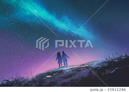 young couple standing against the Milky Way galaxy young couple standing against the Milky Way galaxy 25612286