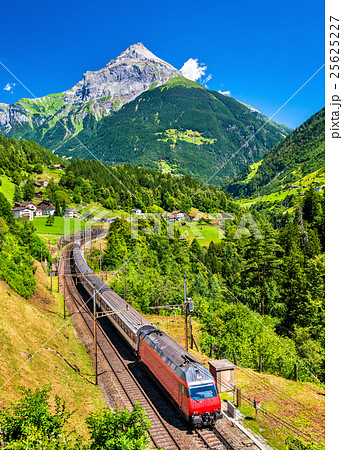 Intercity train climbs up the Gotthard railway - 25625227