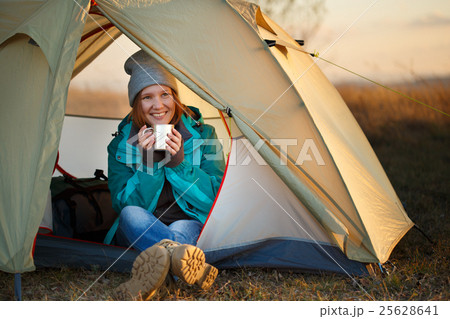 Smiling female traveller in sports wear 25628641