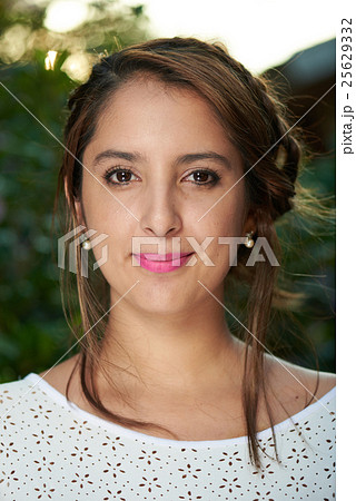 headshot of girl with braid 25629332