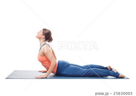 Sporty fit yogini woman practices yoga asana 25630005