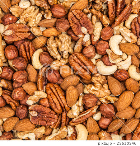 Mix of different nuts closeup photo Mix of different nuts closeup photo 25630546