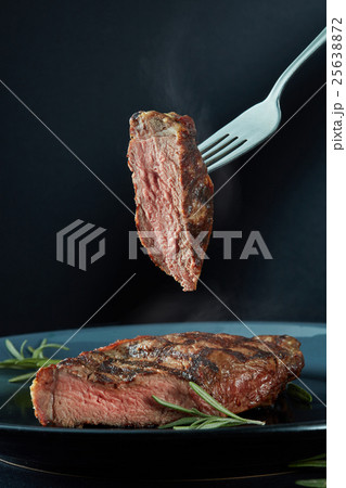 Beef steak medium grilled 25638872