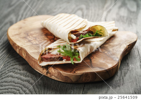 fresh homemade burritos with beef on olive fresh homemade burritos with beef on olive 25641509