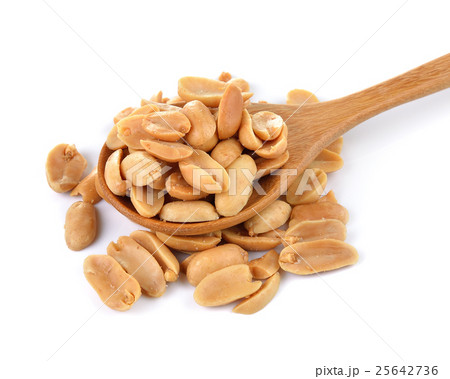peanuts in spoon on white background peanuts in spoon on white background 25642736