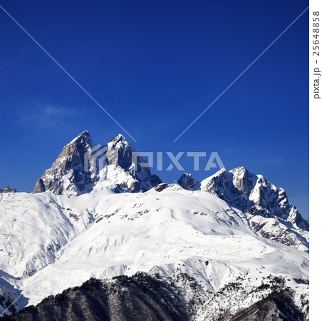 Snow mountains in winter at sun day 25648858