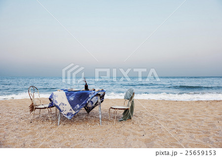 Table Chairs Meal Sea Shore Holiday Sky Concept 25659153