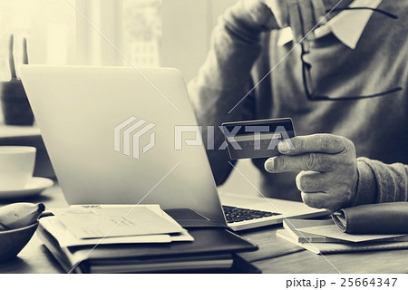 Senior Adult Holding Credit Card Concept Senior Adult Holding Credit Card Concept 25664347