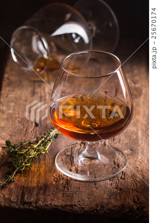 Glass of brandy or cognac  25670174