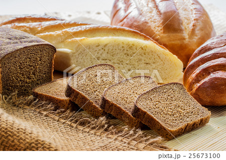 Rye bread and white long loaf. 25673100