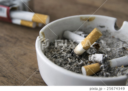 Cigarettes in an ashtray Cigarettes in an ashtray 25674349