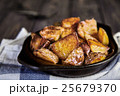 Baked potato wedges with garlic, christmas garnish 25679370
