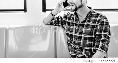 Young Man Outdoors Talking Smartphone Concept Young Man Outdoors Talking Smartphone Concept 25685354