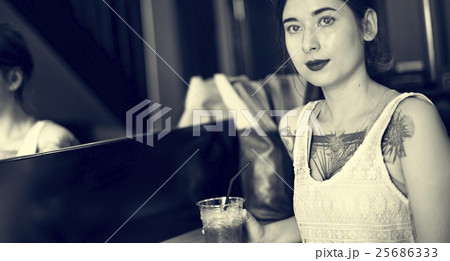 Woman Sitting Alone Drink Cafe Concept Woman Sitting Alone Drink Cafe Concept 25686333