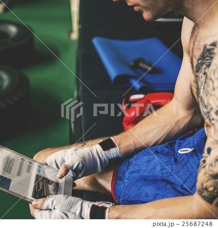 Man Exercise Athletic Boxing Tablet Concept 25687248