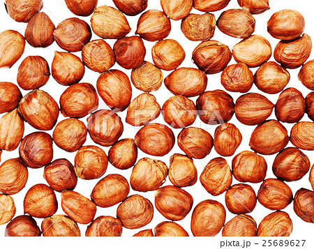 Hazelnuts background isolated on white. Hazelnuts background isolated on white. 25689627