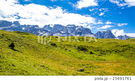 green plateau of the Dolomites in Trentino 25691761