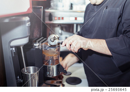 Barista prepares Barista prepares 25693645