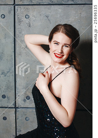 Seductive sexy model posing in loft interior Seductive sexy model posing in loft interior 25696335