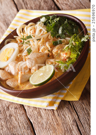 Malaysian laksa soup with chicken 25696970