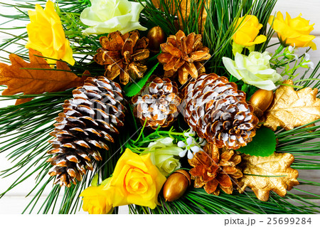 Christmas background with golden pine cones 25699284