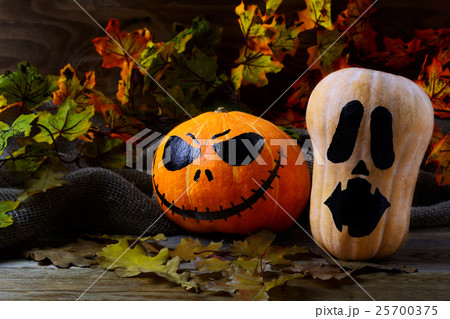 Halloween Stingy Jack pumpkins on dark background 25700375