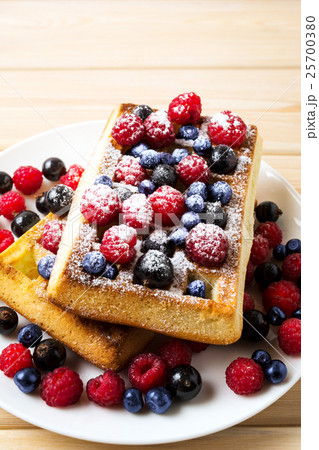 Homemade breakfast Belgian waffles with blueberry Homemade breakfast Belgian waffles with blueberry 25700380