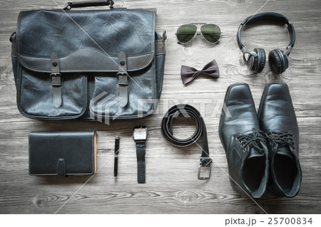 Men's casual outfits with accessories on on wood Men's casual outfits with accessories on on wood 25700834