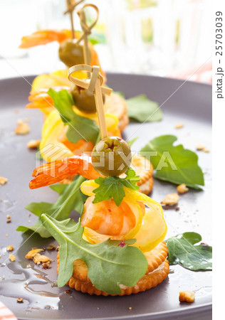 Canapes with prawns. 25703039