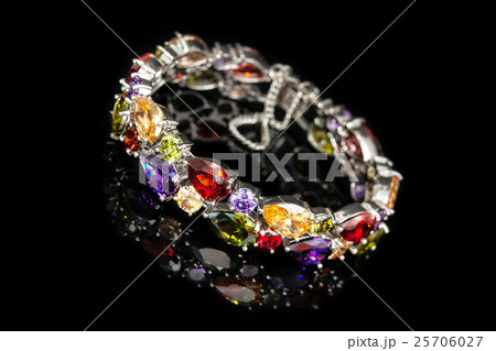 Bracelet with colorful stones isolated on black Bracelet with colorful stones isolated on black 25706027