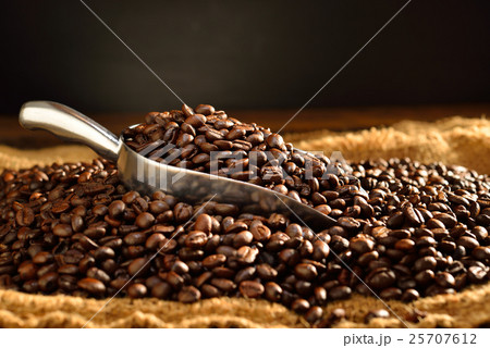 Coffee beans on burlap 25707612