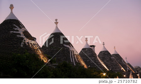Trulli at sunset in Alberobello (Italy) Trulli at sunset in Alberobello (Italy) 25710782