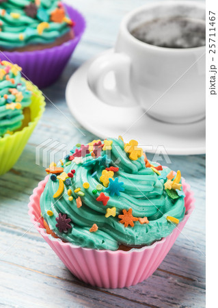 Fresh cupcakes and hot coffee  25711467