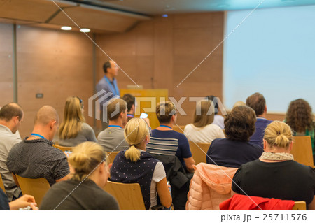 Audience in lecture hall on scientific conference. 25711576