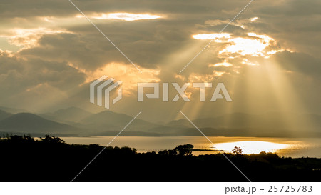 Sun rays during sunrise over the moutain Sun rays during sunrise over the moutain 25725783