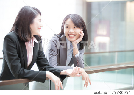 two businesswoman talk in airport two businesswoman talk in airport 25730954