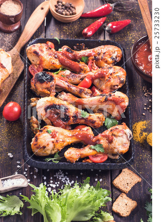 Drumsticks on serving pan 25733230