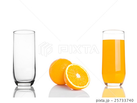 Glass of healthy organic orange juice on white 25733740
