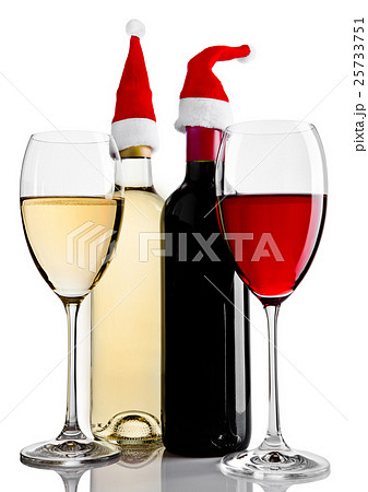 Bottles and glasses of red white wine santa hat 25733751