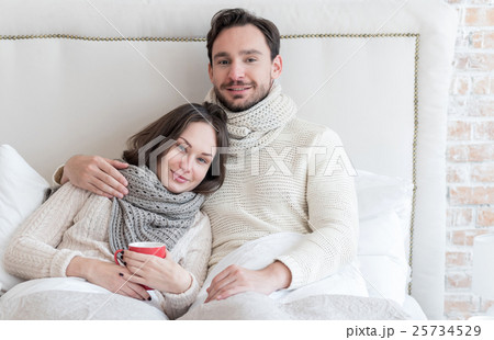 Joyful bearded man hugging his girlfriend 25734529