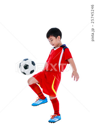 Young asian soccer player with soccer ball.  25745246