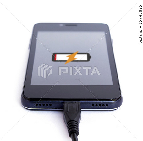 Smart phone is charging on white background Smart phone is charging on white background 25748825