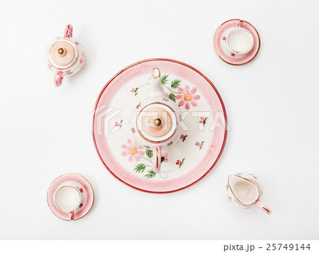 above view of pink porcelain tea set on white above view of pink porcelain tea set on white 25749144