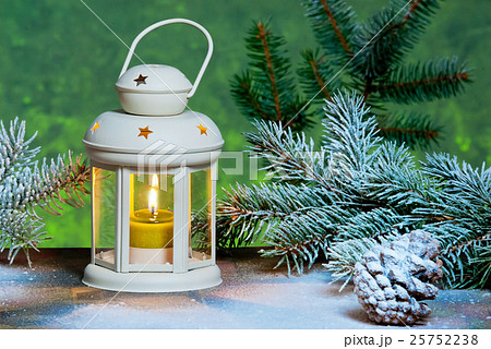 lantern and Christma tree in the snow 25752238